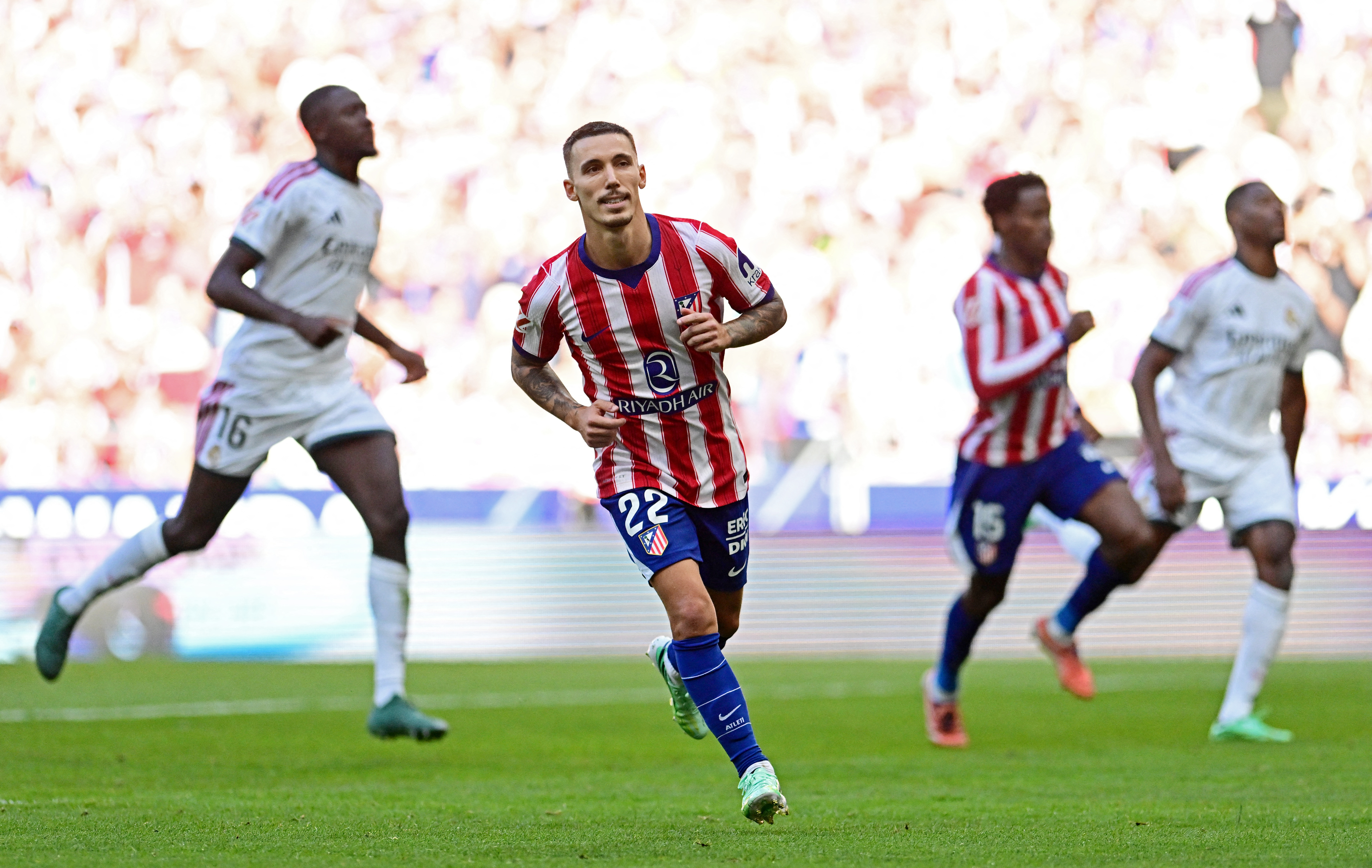 Atletico ride derby storm to beat 10-man Real Madrid