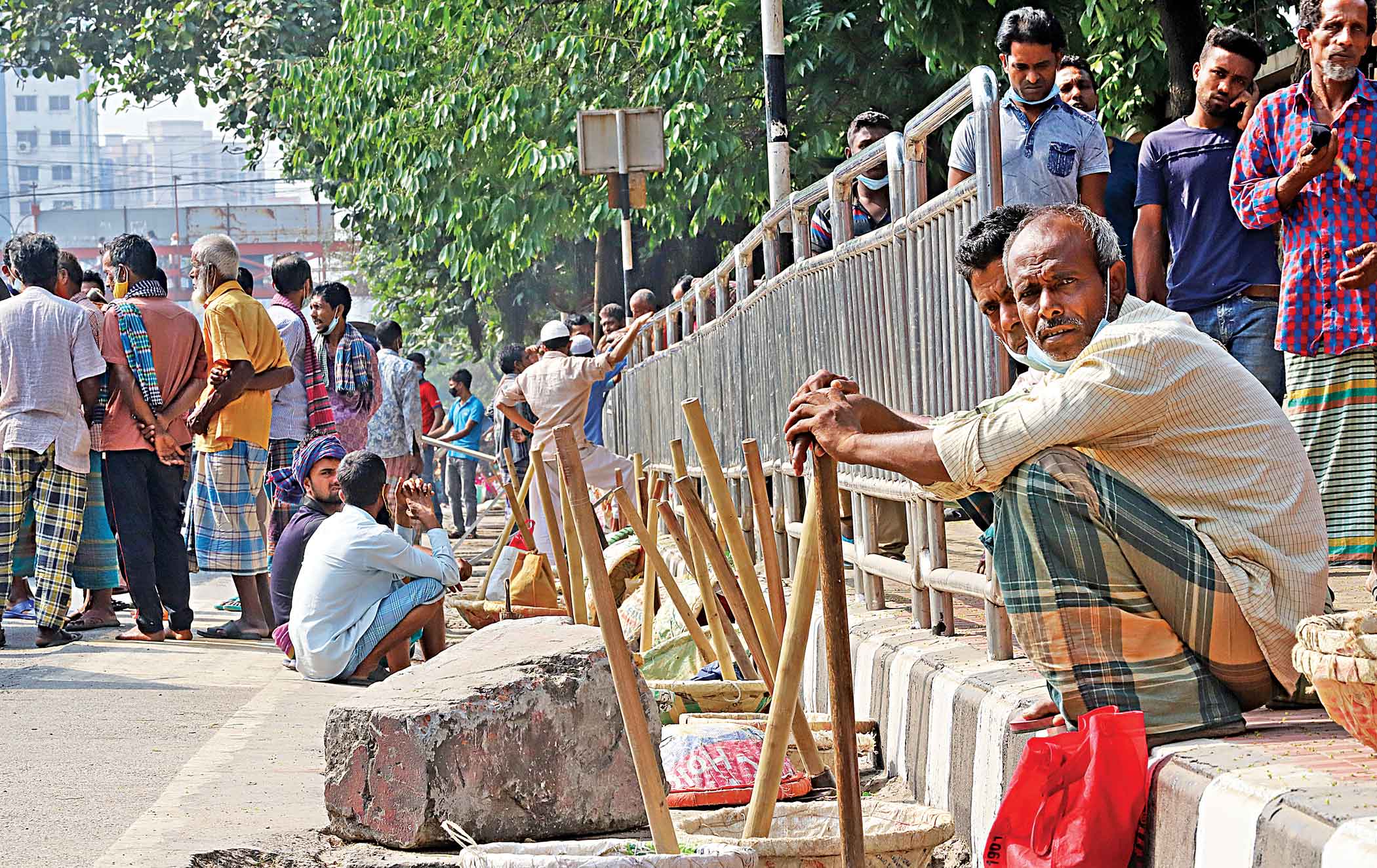 Wage growth ticks up in May but falls behind inflation 