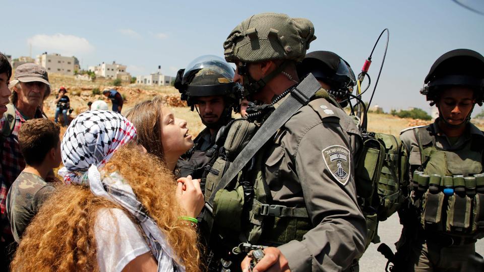 Hitting Israeli soldiers: Palestinian girl sparks debate