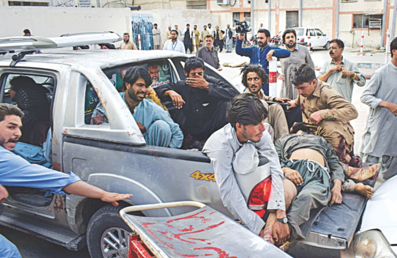 Suicide blast kills 128 in Pak election rally