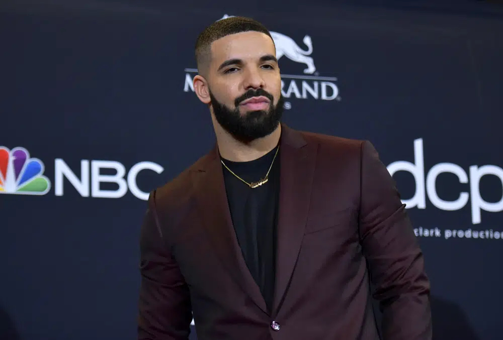 Drake teases new music at Apollo show
