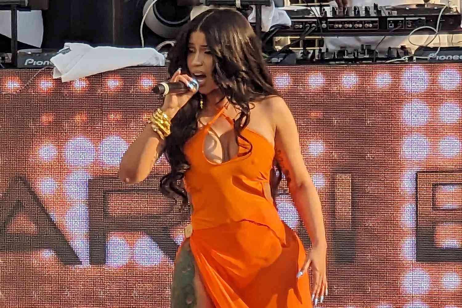 Cardi B tosses microphone at concertgoer who threw drink on her 