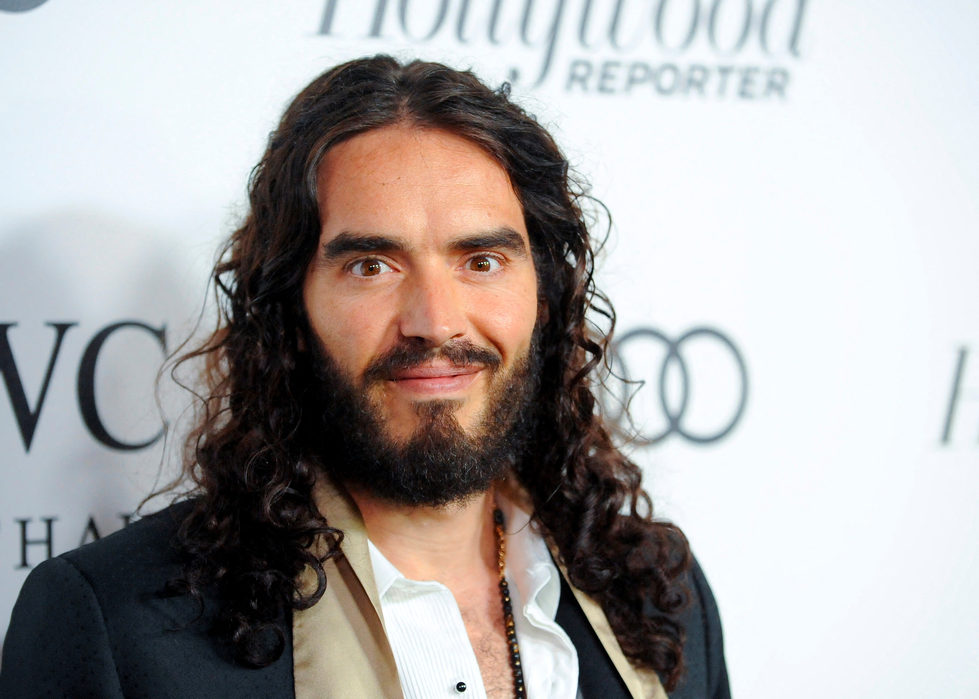 UK police charge comedian Russell Brand with rape, sexual assaults