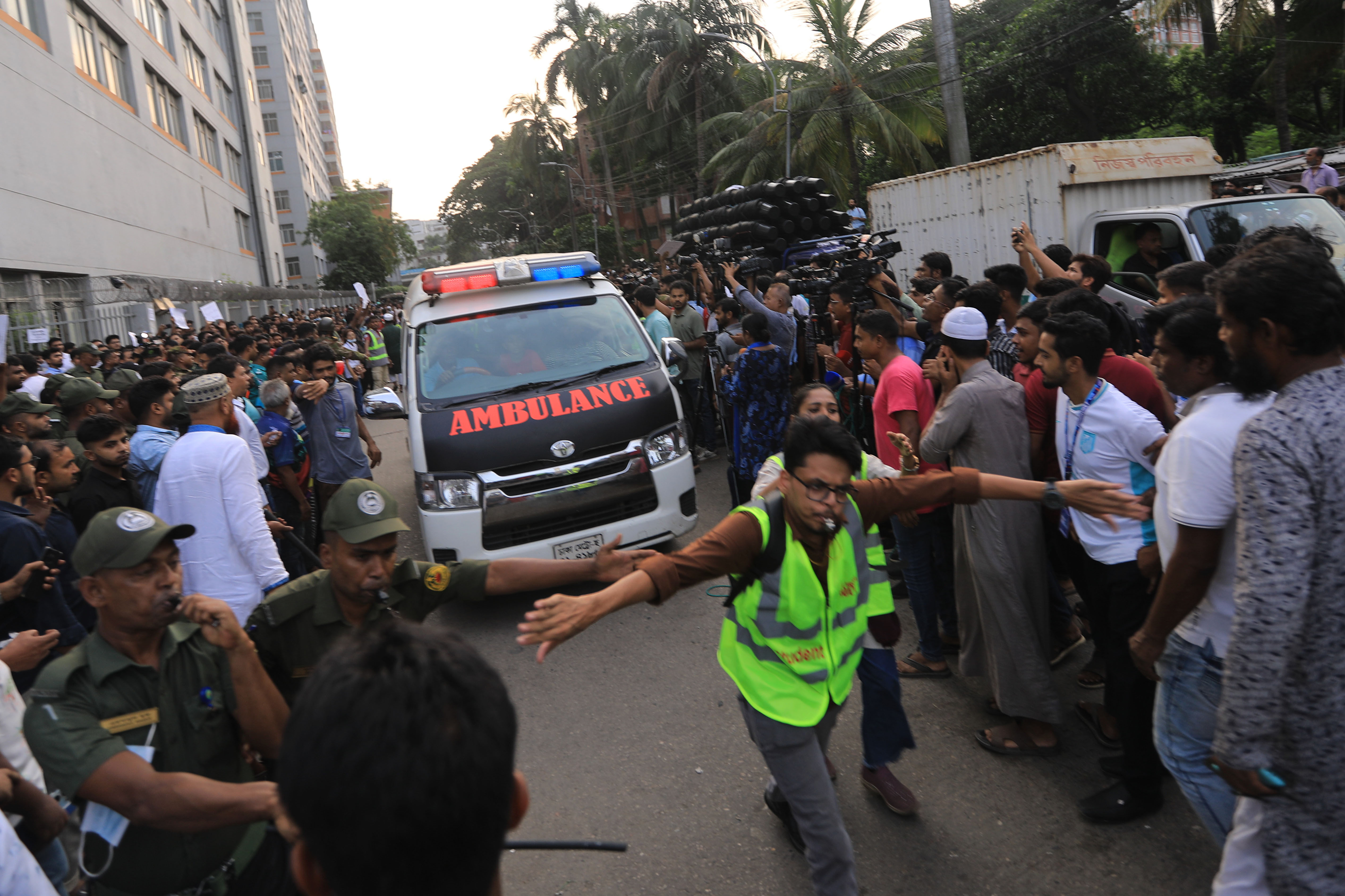 Side by side in bandages, siblings fight to survive