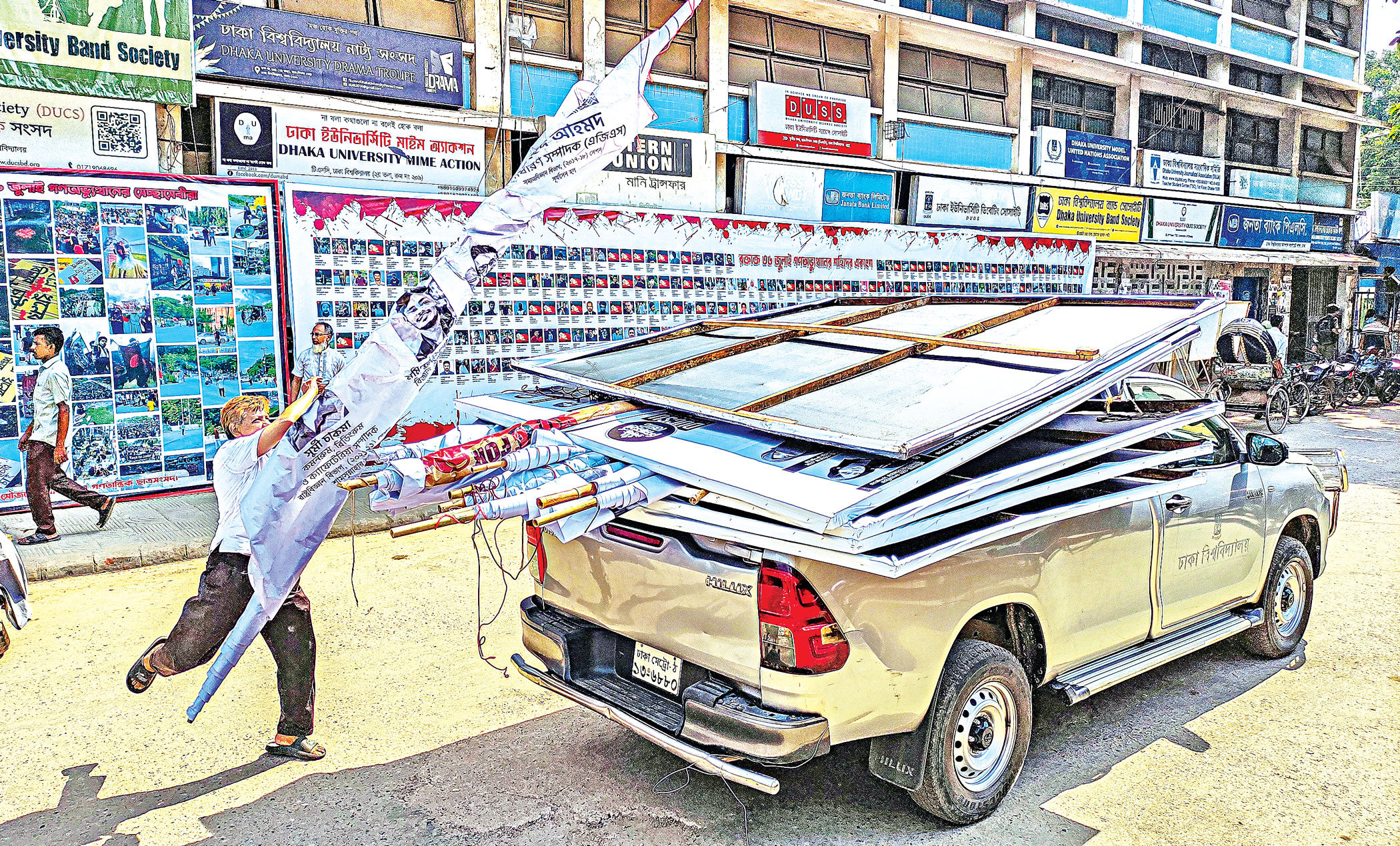 Authorities pull down campaign posters, banners