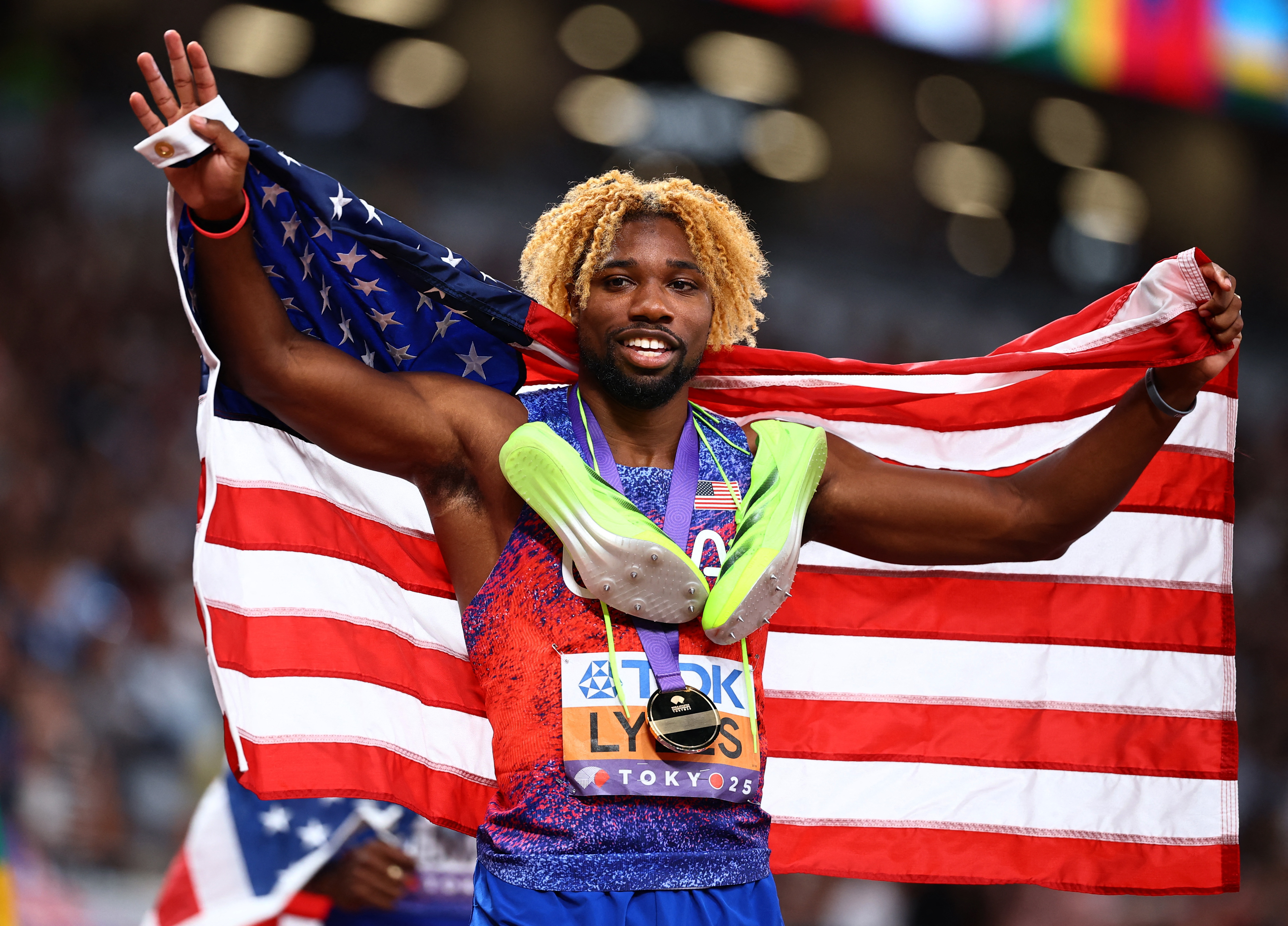 Lyles emulates Bolt with fourth world 200m title