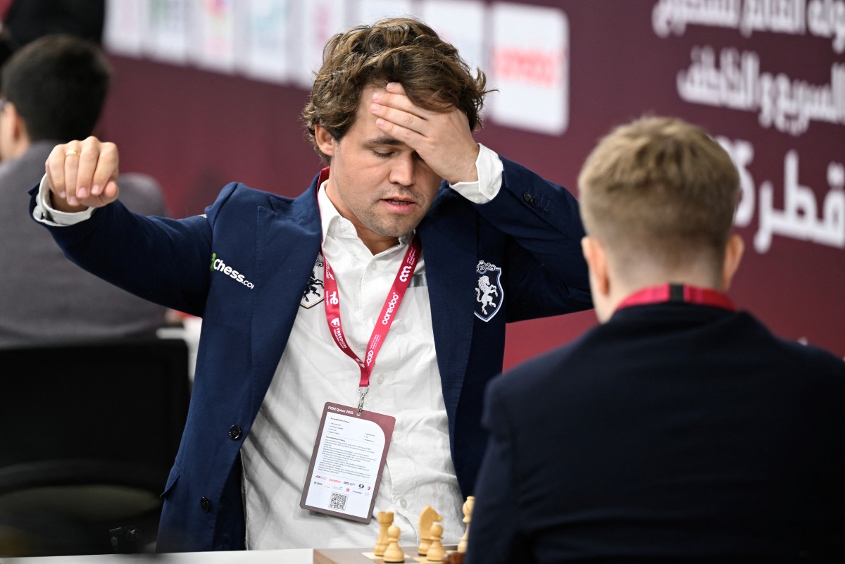 Carlsen claims sixth world rapid chess title in Qatar