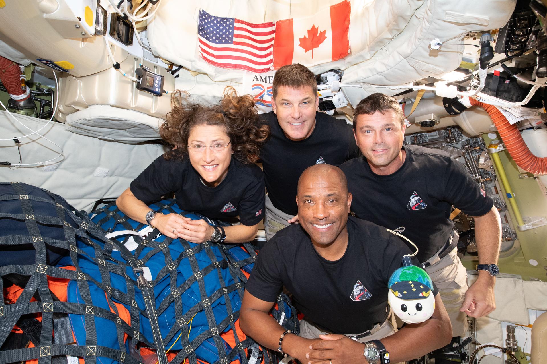 The Artemis II crew – (clockwise from left) Mission Specialist Christina Koch, Mission Specialist Jeremy Hansen, Commander Reid Wiseman, and Pilot Victor Glover. 