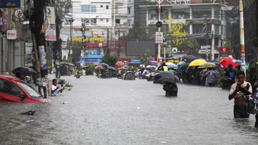 Prabartak intersection in Chattogram was submerged following heavy rainfall yesterday. Photo: Rajib Raihan