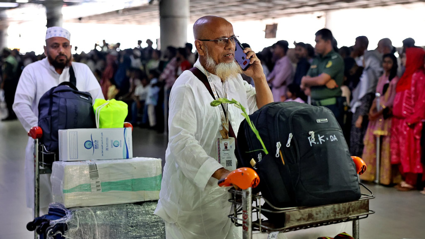 A Bangladeshi pilgrim arrives at Hazrat Shahjalal International Airport on Biman Bangladesh Airlines' first post-Hajj return flight from Saudi Arabia. Photo: Star