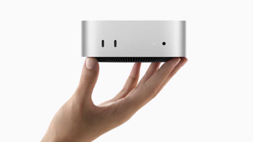 M6 mac mini in hand