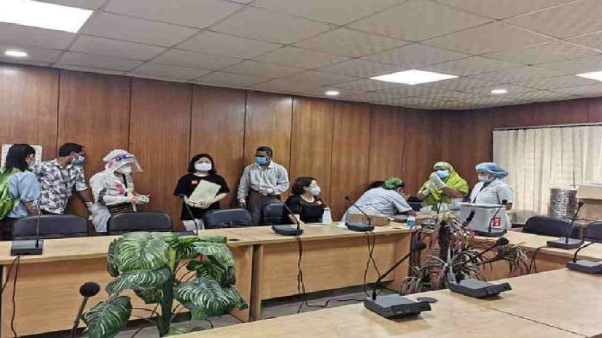 chinese workers UNB.JPG