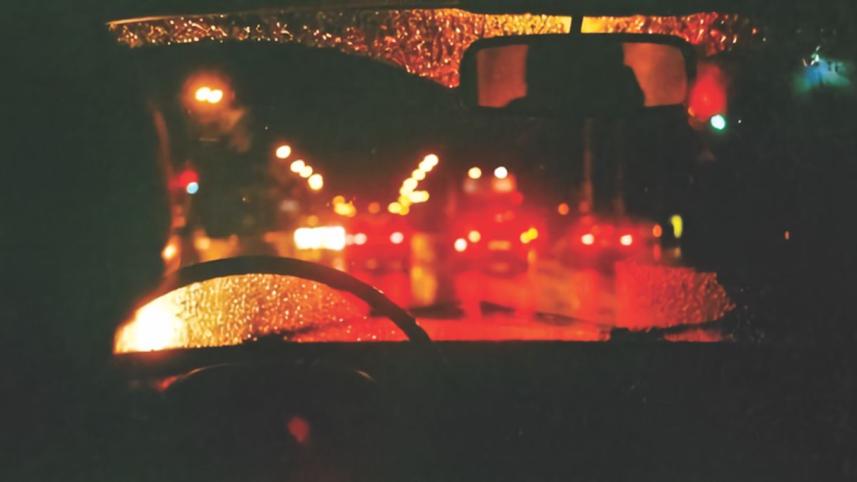 A Girl Driving around Dhaka at Midnight