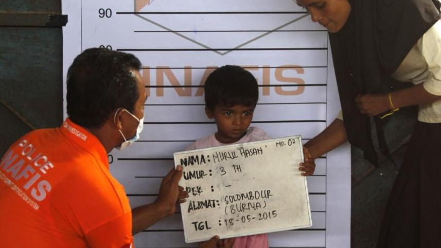 A Rohingya child being identified in Kuala Langsa, Indonesia