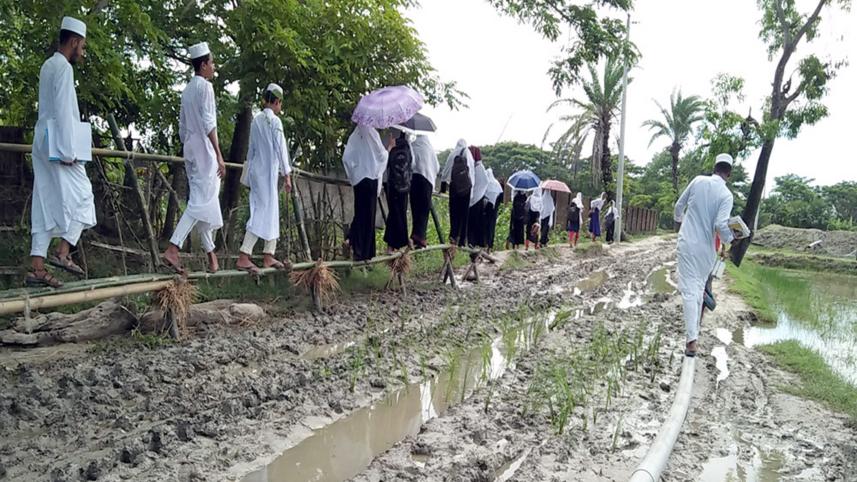 bamboo bridge muddy road.jpg