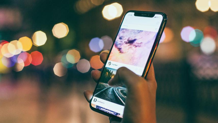 bokeh-photography-of-person-holding-turned-on-iphone-1440727.jpg