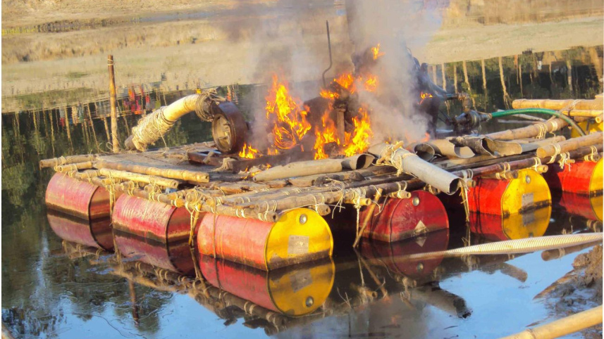 dredger gets burnt.jpg