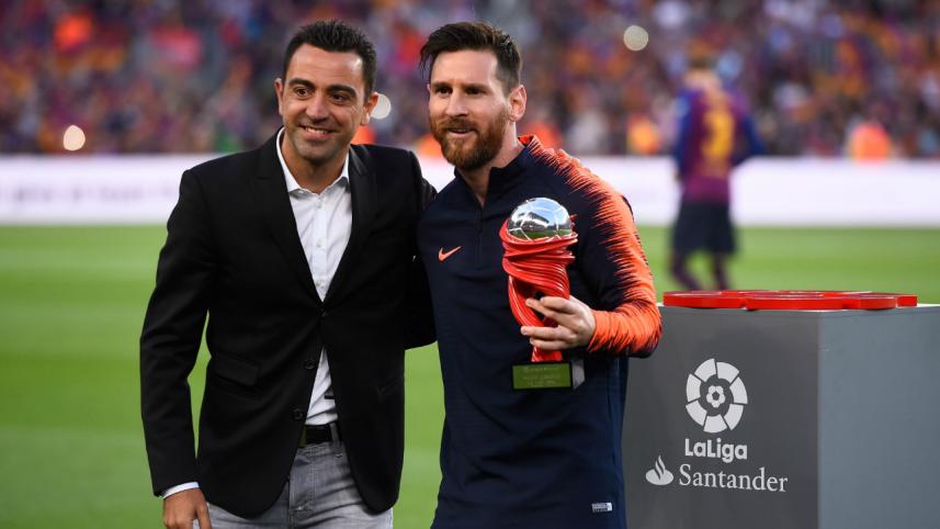 Messi and Xavi.jpg