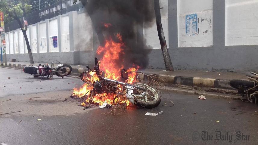 Three motorcycles are torched near Azimpur bus stand in Dhaka