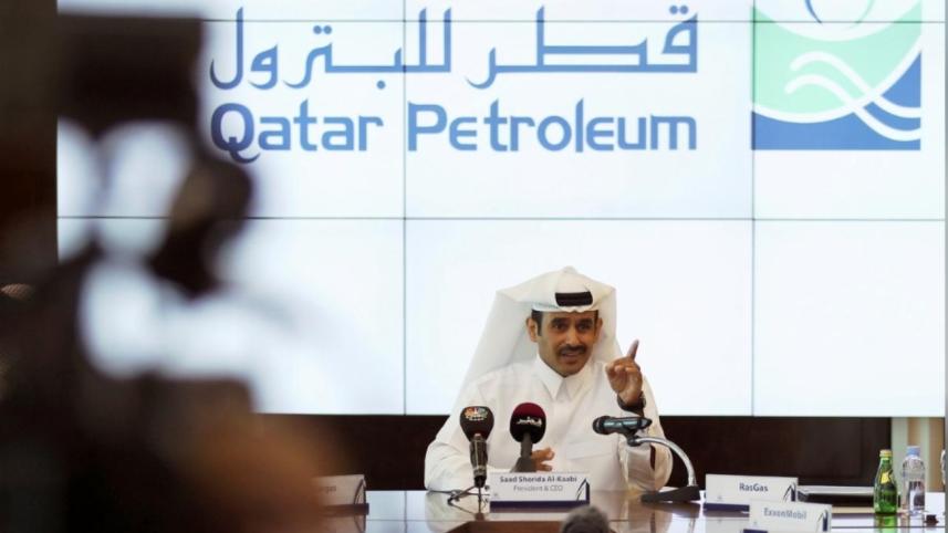 Oil giants shower Qatar.jpg