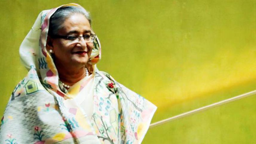 Prime Minister Sheikh Hasina hands over Danveer Ranada Prasad Shaha Gold Medal