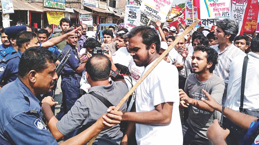 Police charge batons.jpg