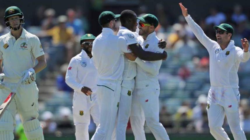 SA celebrate a wicket.jpg