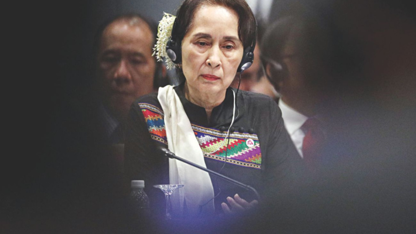 Suu Kyi calls peace.jpg