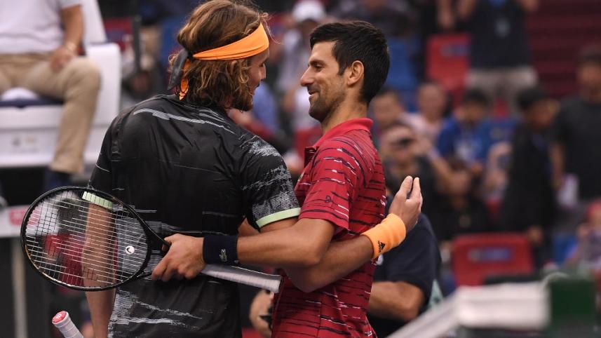 Tsitsipas and Djokovic.jpg