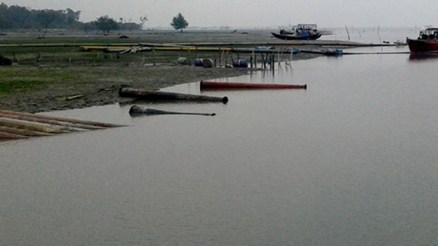 Two siblings continue sand lifting.jpg