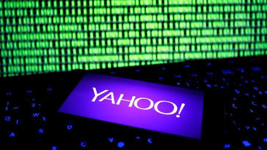 A photo illustration shows a Yahoo logo