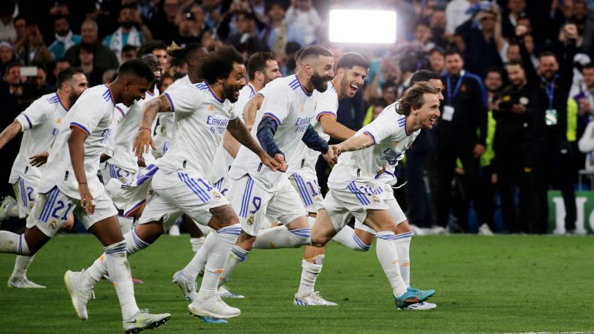 The Real Madrid Team celebrating their comeback.