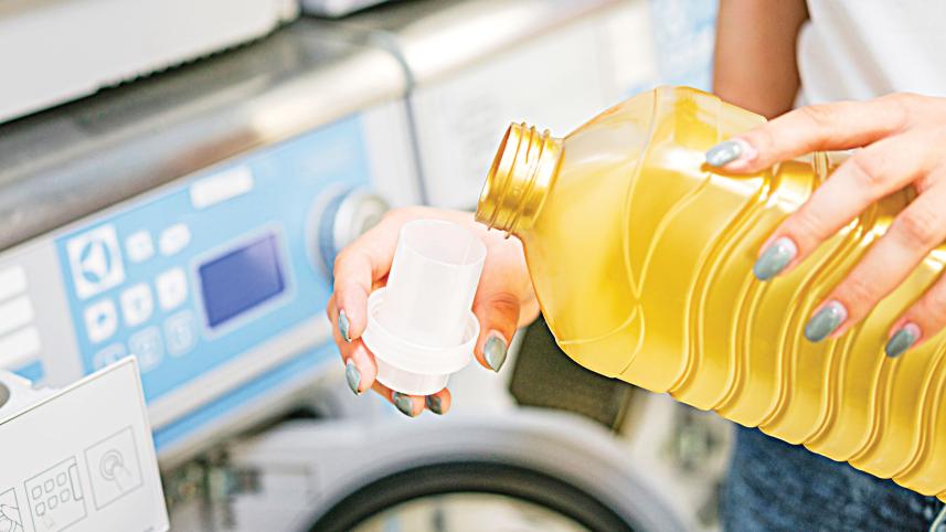 woman-pouring-detergent-cap.jpg