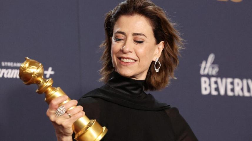ernanda Torres poses with the award for Best Performance by an Actress in a Motion Picture — Drama for "I'm Still Here" at the 82nd Golden Globe Awards in Beverly Hills,jpg