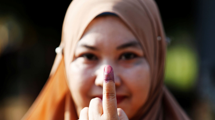 5.-a-woman-casting-vote.jpg