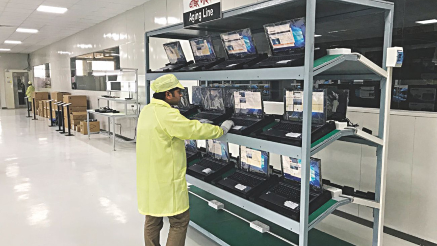 inside_waltons_mega_computer_factory