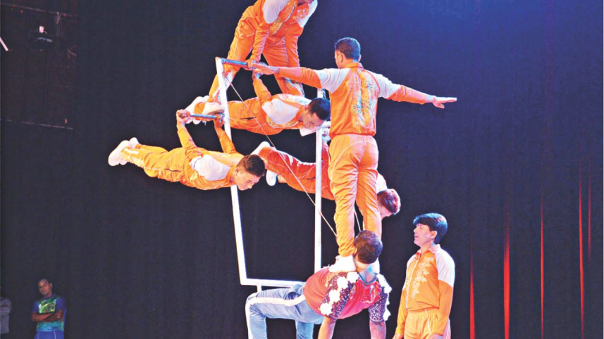 Young acrobats performing