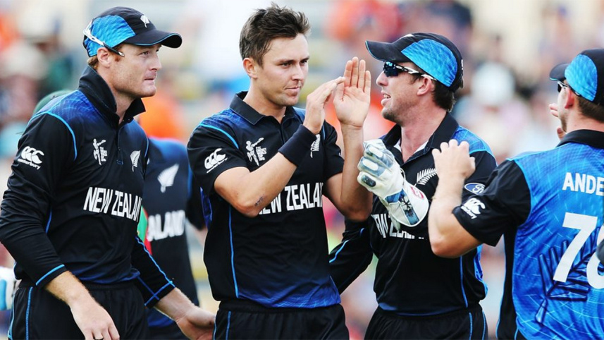 Trent Boult congratulated by teammates