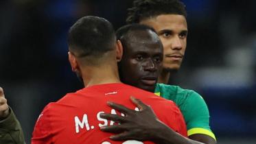 2026-01-14T190820Z_1697863425_UP1EM1E1H5VMX_RTRMADP_3_SOCCER-NATIONS-SEN-EGY (1).jpg