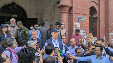 Ivars Ijabs is speaking to reporters after visiting Dhaka University’s Curzon Hall polling centre. Photo: Star