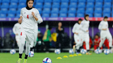 AFP__20260309__A2G78G4__v1__MidRes__FblAfcWomenIriPhi (1).jpg