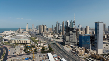 A drone view shows Kuwait City, in the aftermath of strikes by Israel and the U.S. on Iran, in Kuwait, February 28, 2026. Photo: Reuters/Stephanie McGehee