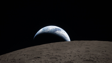 Earthset captured through the Orion spacecraft window.