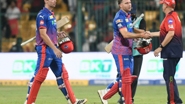 AFP__20260418__A8A86KE__v1__MidRes__CricketIndIplT20BengaluruDelhi (1).jpg