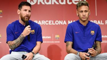 1f0b89762e21066af66fe7fb7cec373a-FC-Barcelona-football-star-Lionel-Messi--L--and-PSG-Neymar--R-.-AFP-file-photo.jpg