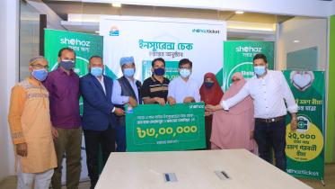 Photo from Shohoz_Insurance claim cheque handover resized.jpg