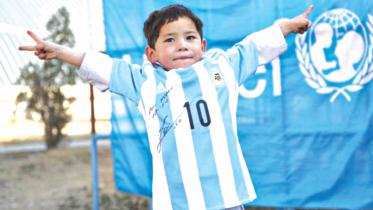 afghan boy messi.jpg