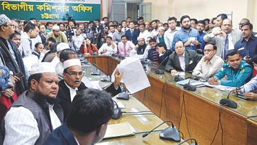 Nomination forms being scrutinised at the returning officer's office in Chattogram