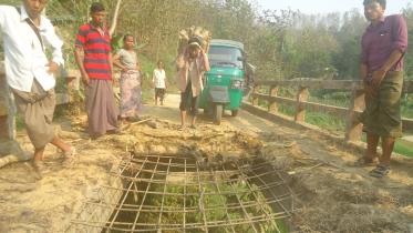 Broken bridge woes Bandarban.jpg
