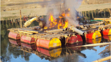 dredger gets burnt.jpg